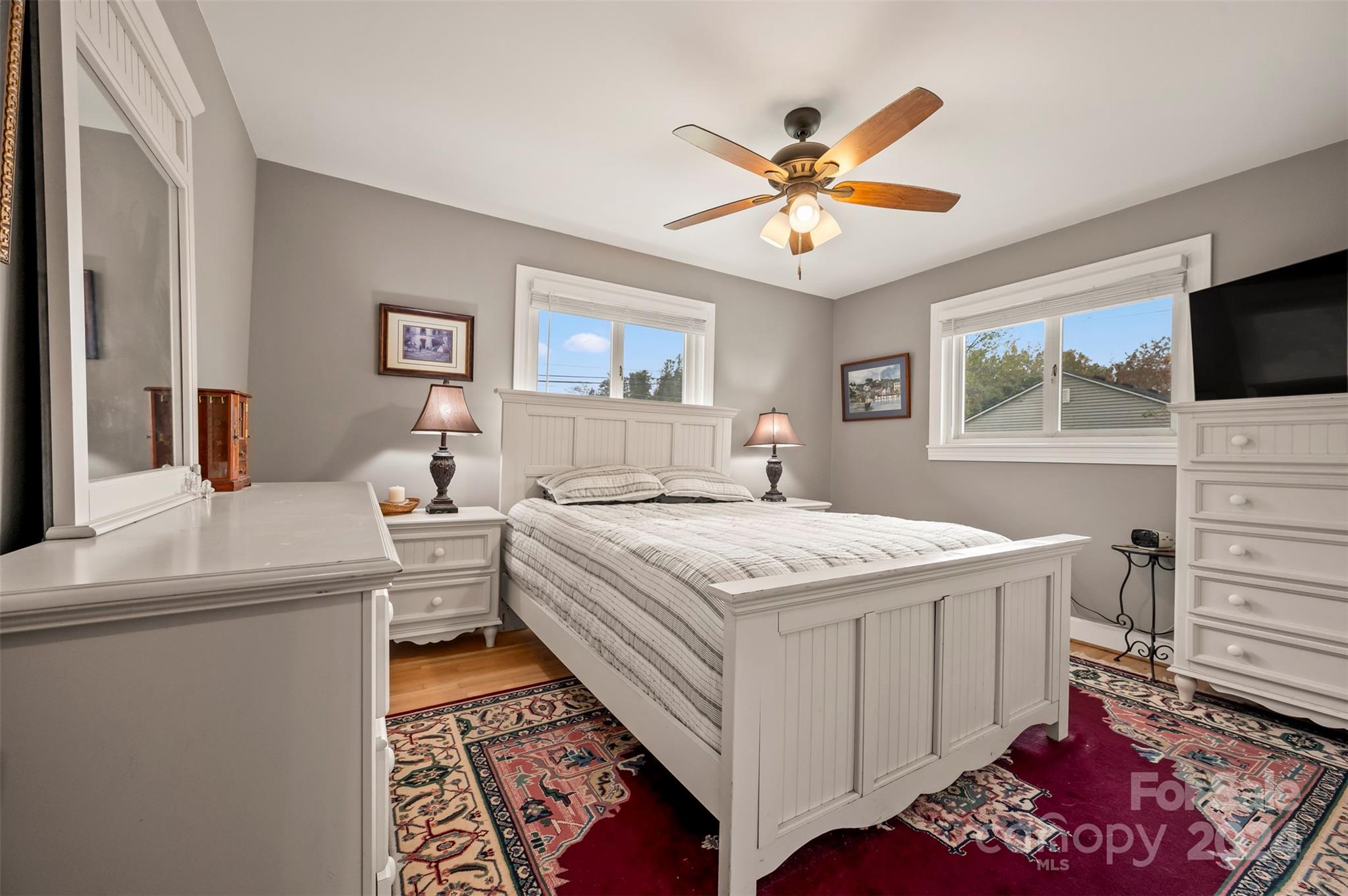 690-684 Chimney Rock Road Rutherfordton, NC 28139 - Photo 22 of 39 a bedroom with a bed and a flat screen tv