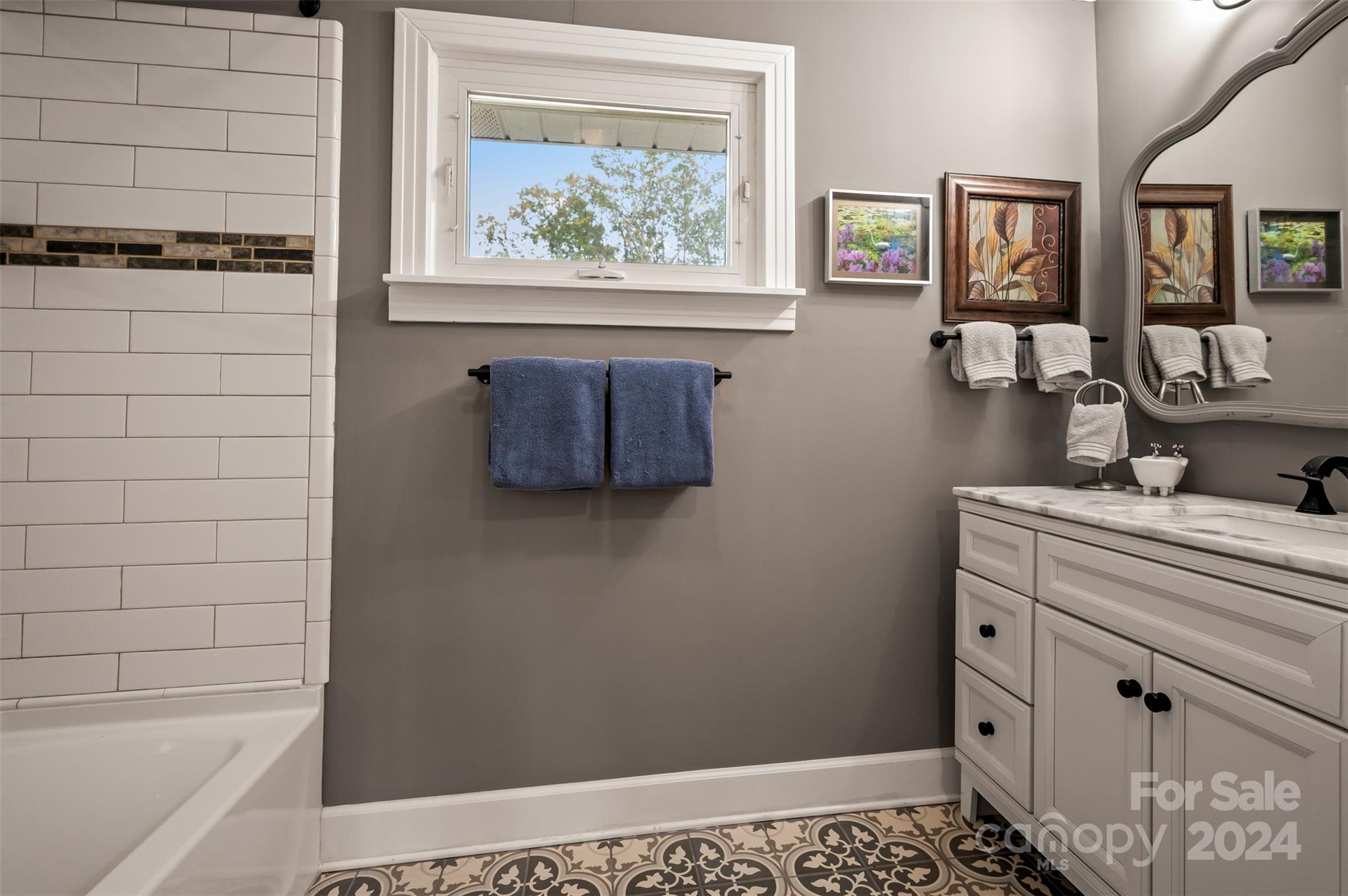 690-684 Chimney Rock Road Rutherfordton, NC 28139 - Photo 25 of 39 a bathroom with a bathtub and a shower