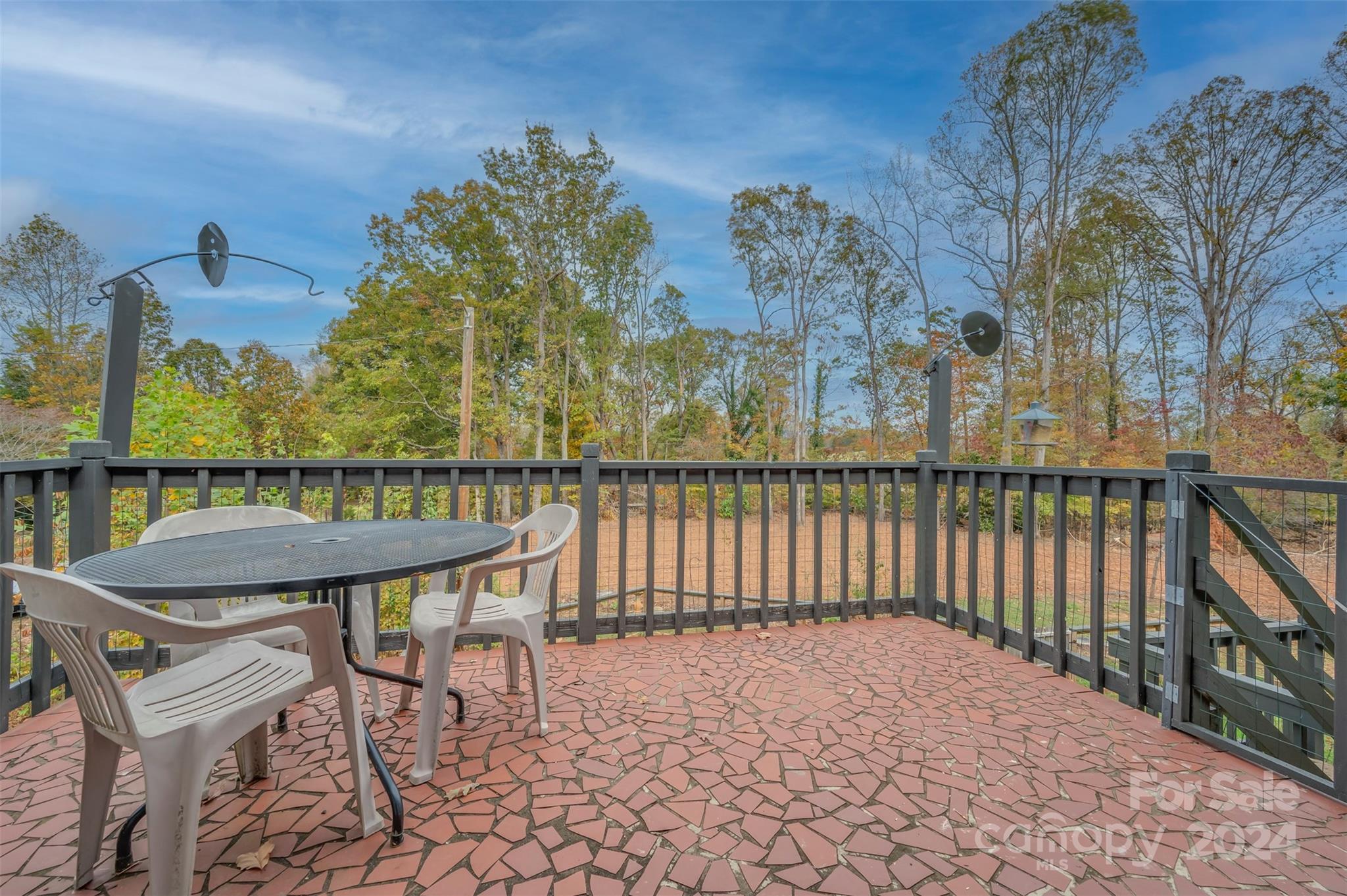 690-684 Chimney Rock Road Rutherfordton, NC 28139 - Photo 30 of 39 a view of a balcony with chairs