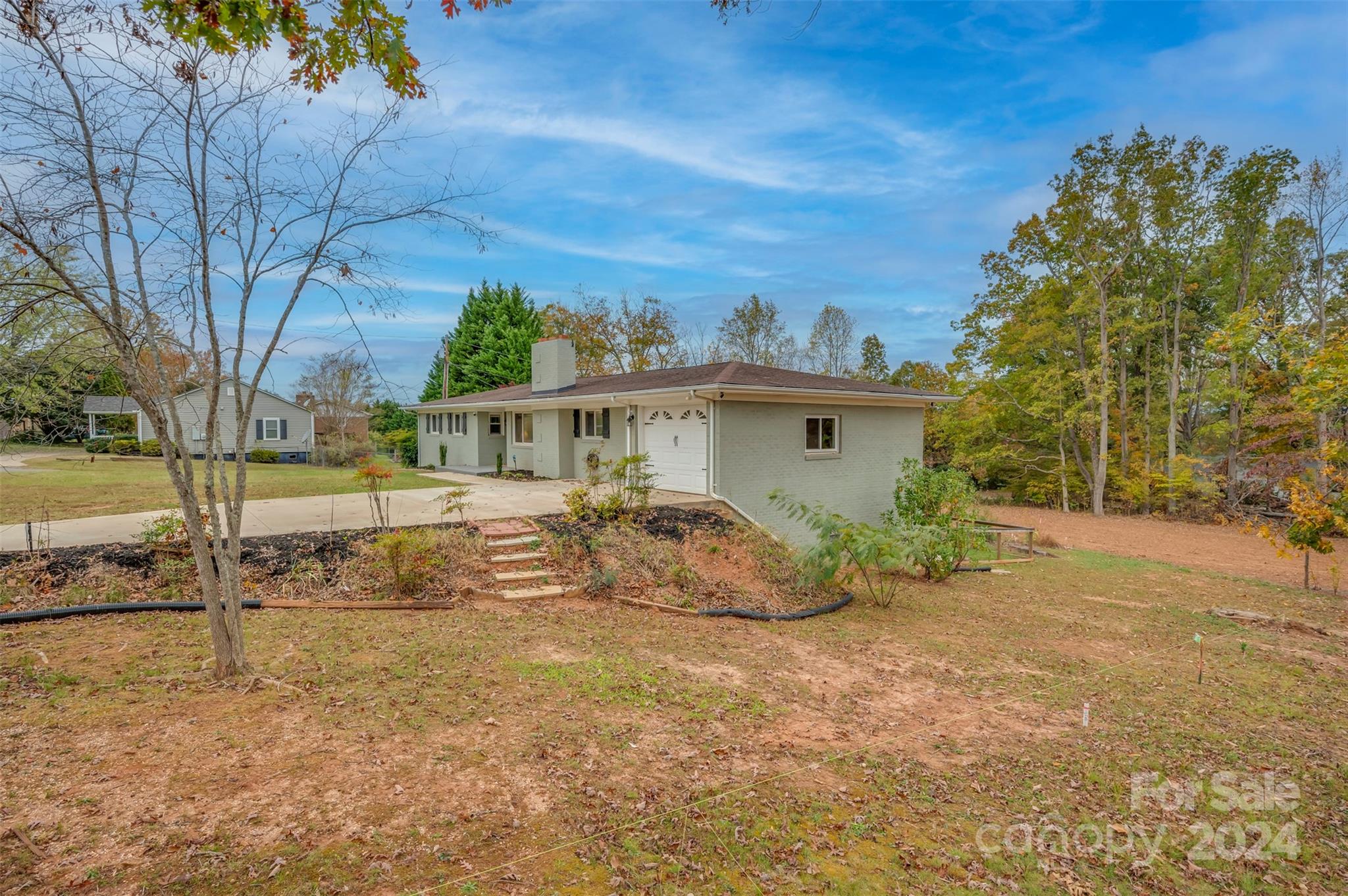690-684 Chimney Rock Road Rutherfordton, NC 28139 - Photo 3 of 39 front view of house with a yard