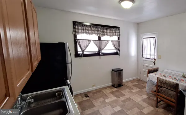 a bedroom with furniture and window