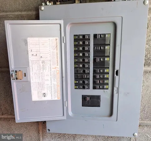 view of wooden floor and windows in a room