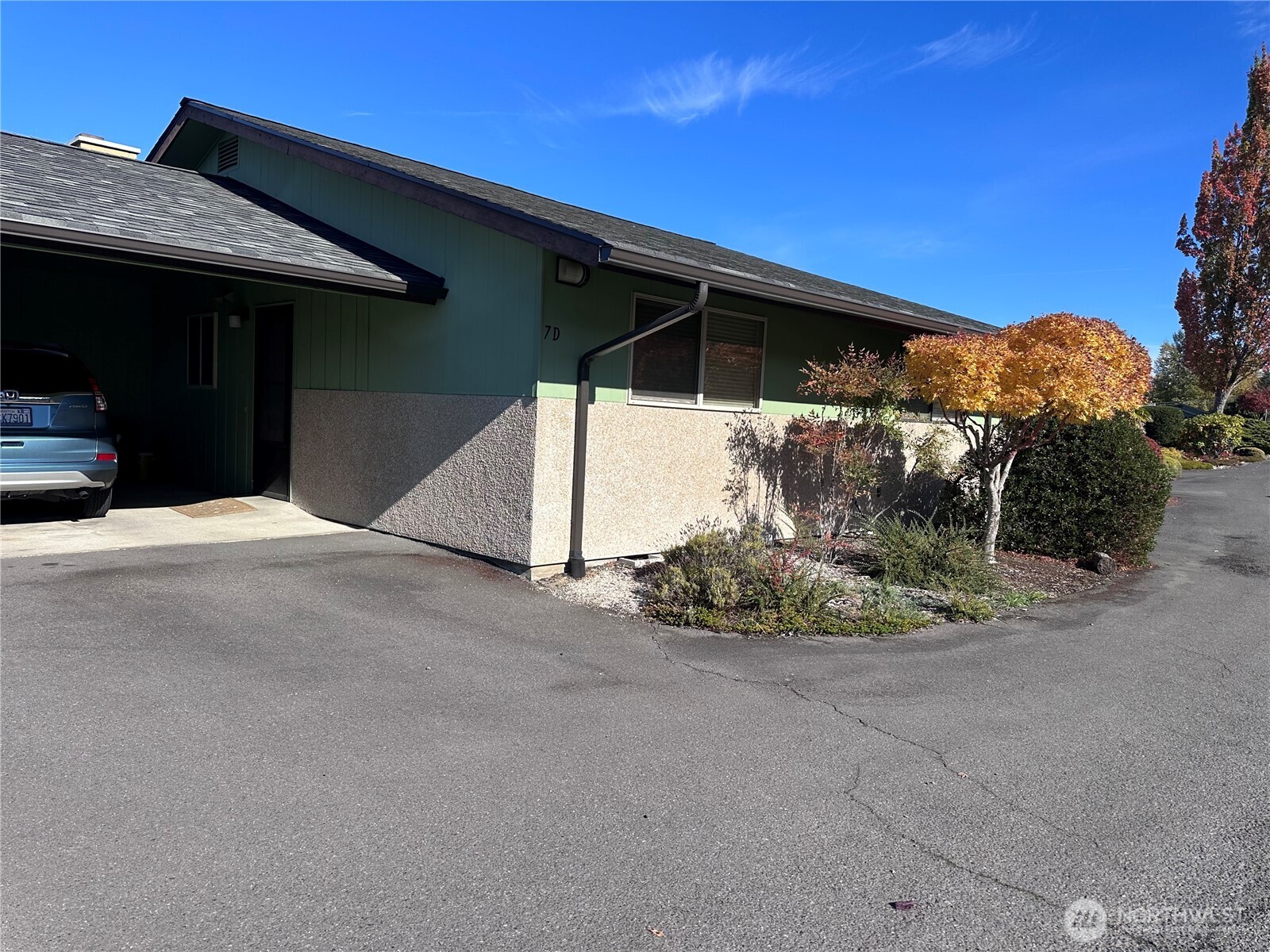 1301 South 3rd Avenue, Unit 7D Sequim, WA 98382 - Photo 32 of 32 a view of a house with a yard