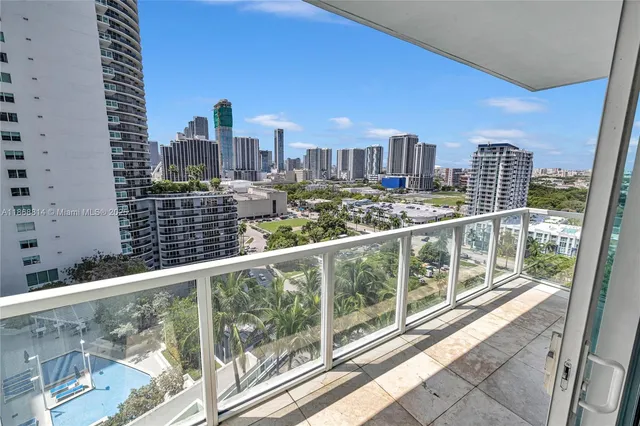 a view of a city skyline from a balcony