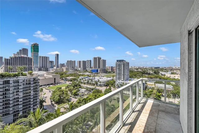 a view of balcony with city