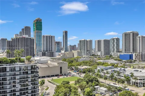 a view of city with tall buildings