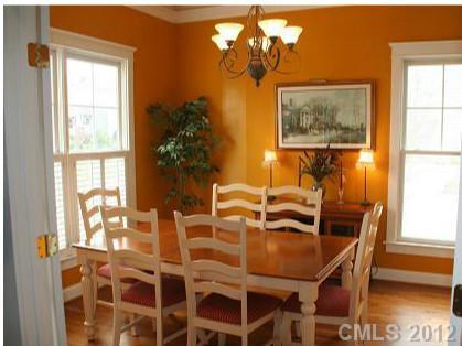 6169 Caseys Side Way Fort Mill, SC 29708 - Photo 5 of 13 a view of a dining room with furniture and chandelier
