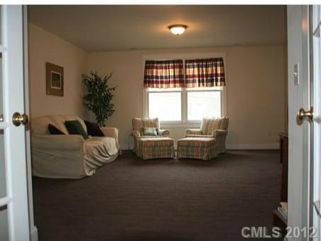 6169 Caseys Side Way Fort Mill, SC 29708 - Photo 10 of 13 a living room with furniture and a large window