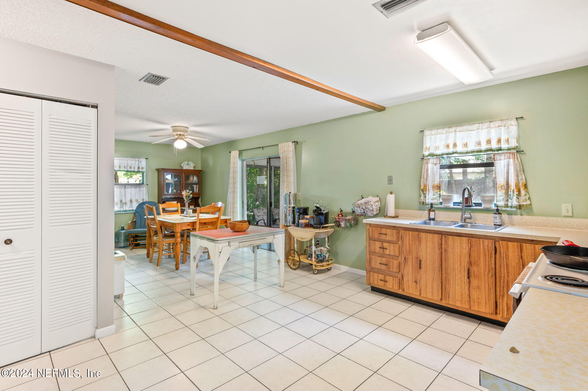 281 Trillo Street St. Augustine, FL 32086 - Photo 16 of 41 a living room with furniture a window and chairs