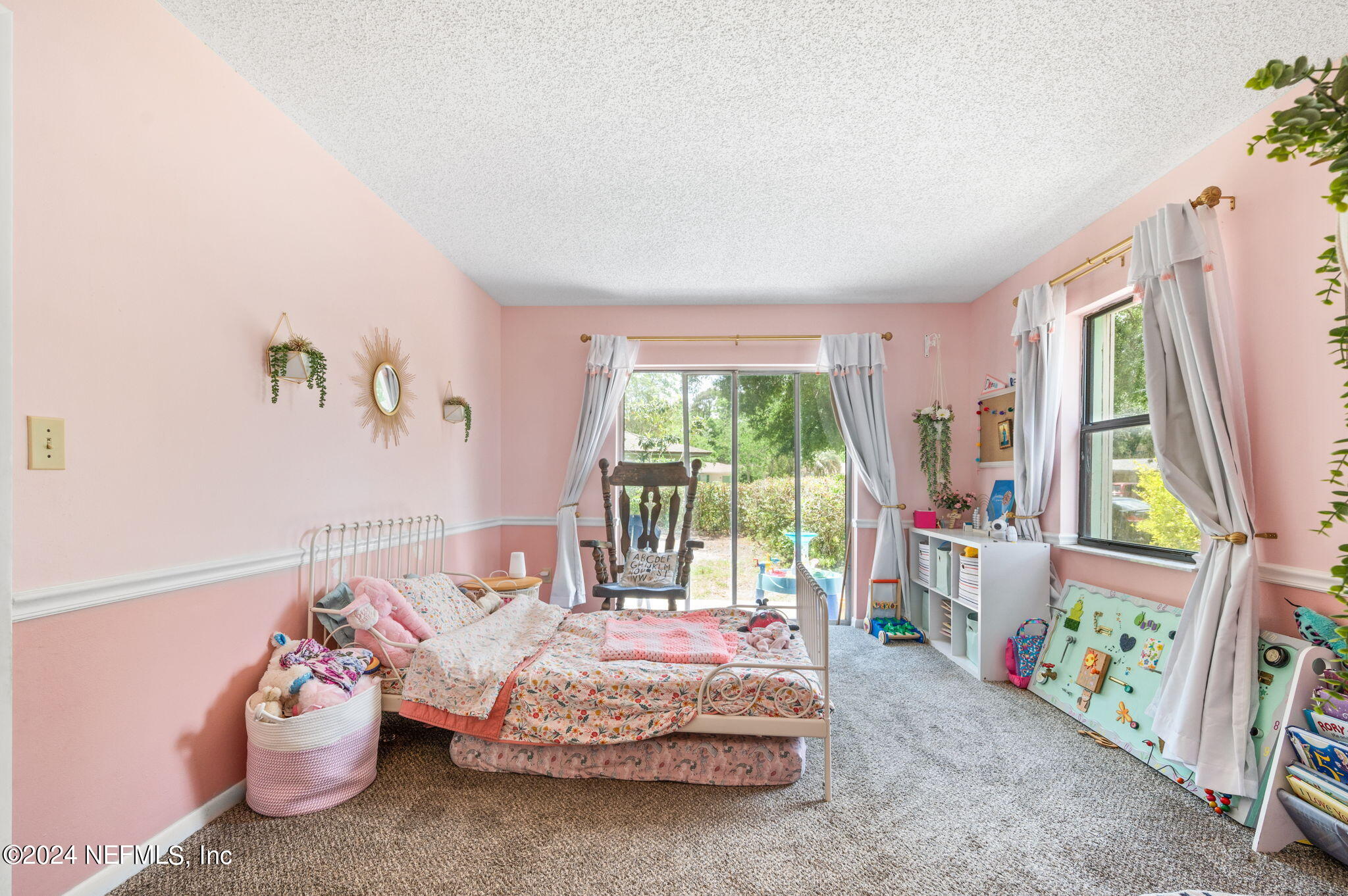 281 Trillo Street St. Augustine, FL 32086 - Photo 22 of 41 a bedroom with bed and a window