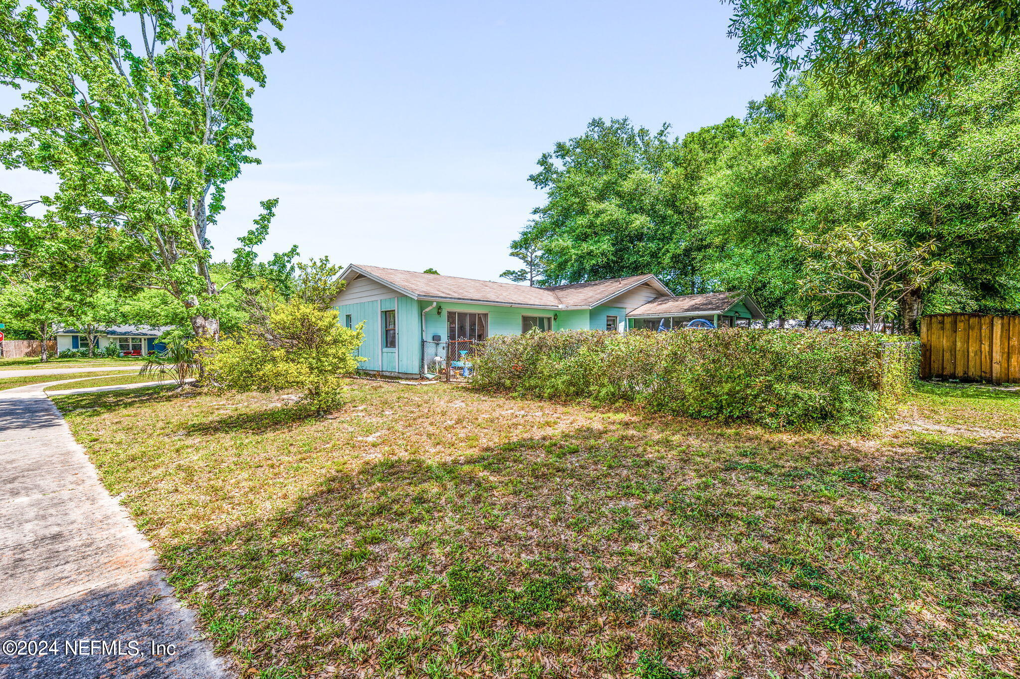 281 Trillo Street St. Augustine, FL 32086 - Photo 3 of 41 a front view of a house with a yard