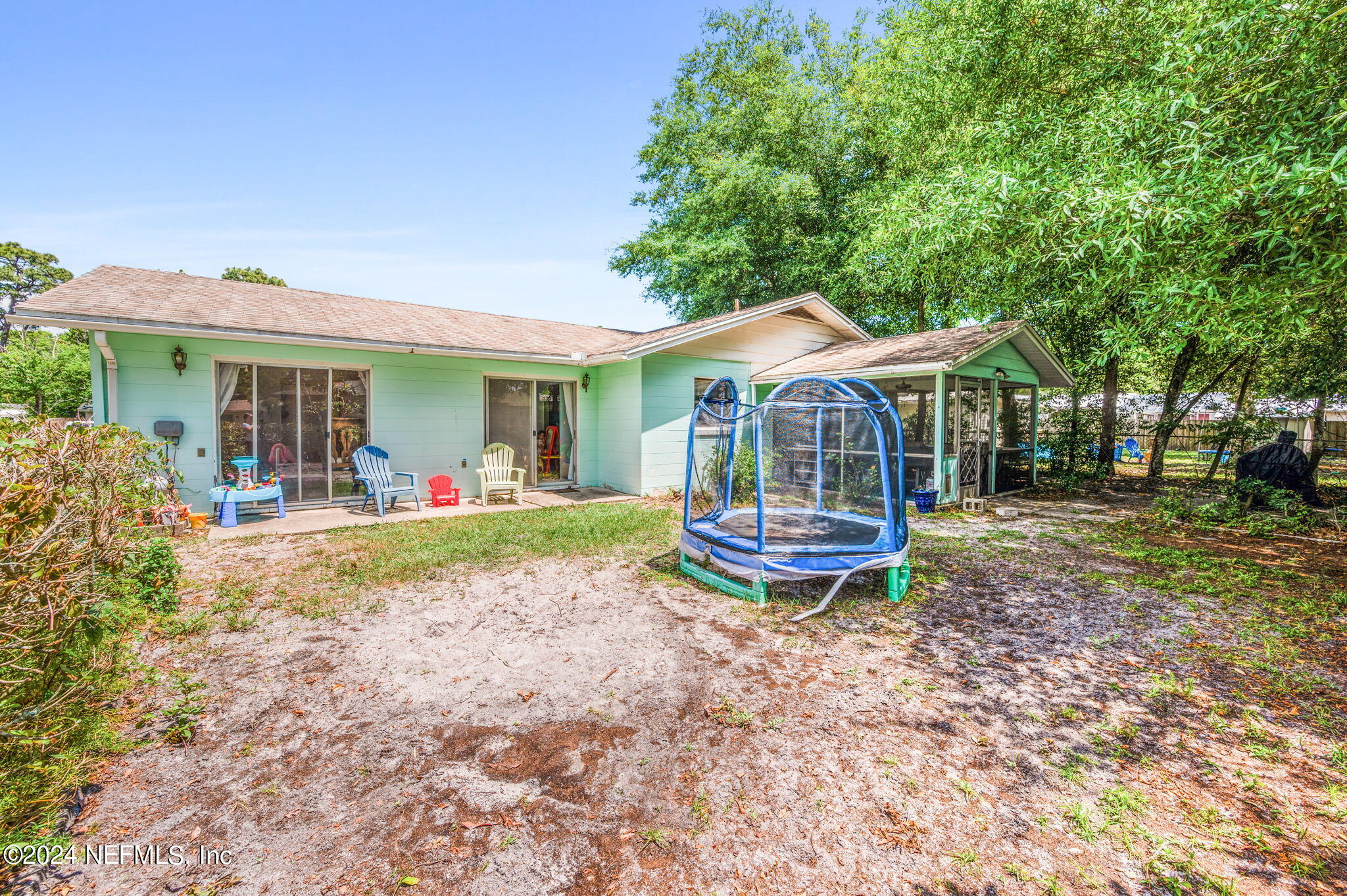 281 Trillo Street St. Augustine, FL 32086 - Photo 33 of 41 a front view of a house with porch yard garden and outdoor seating