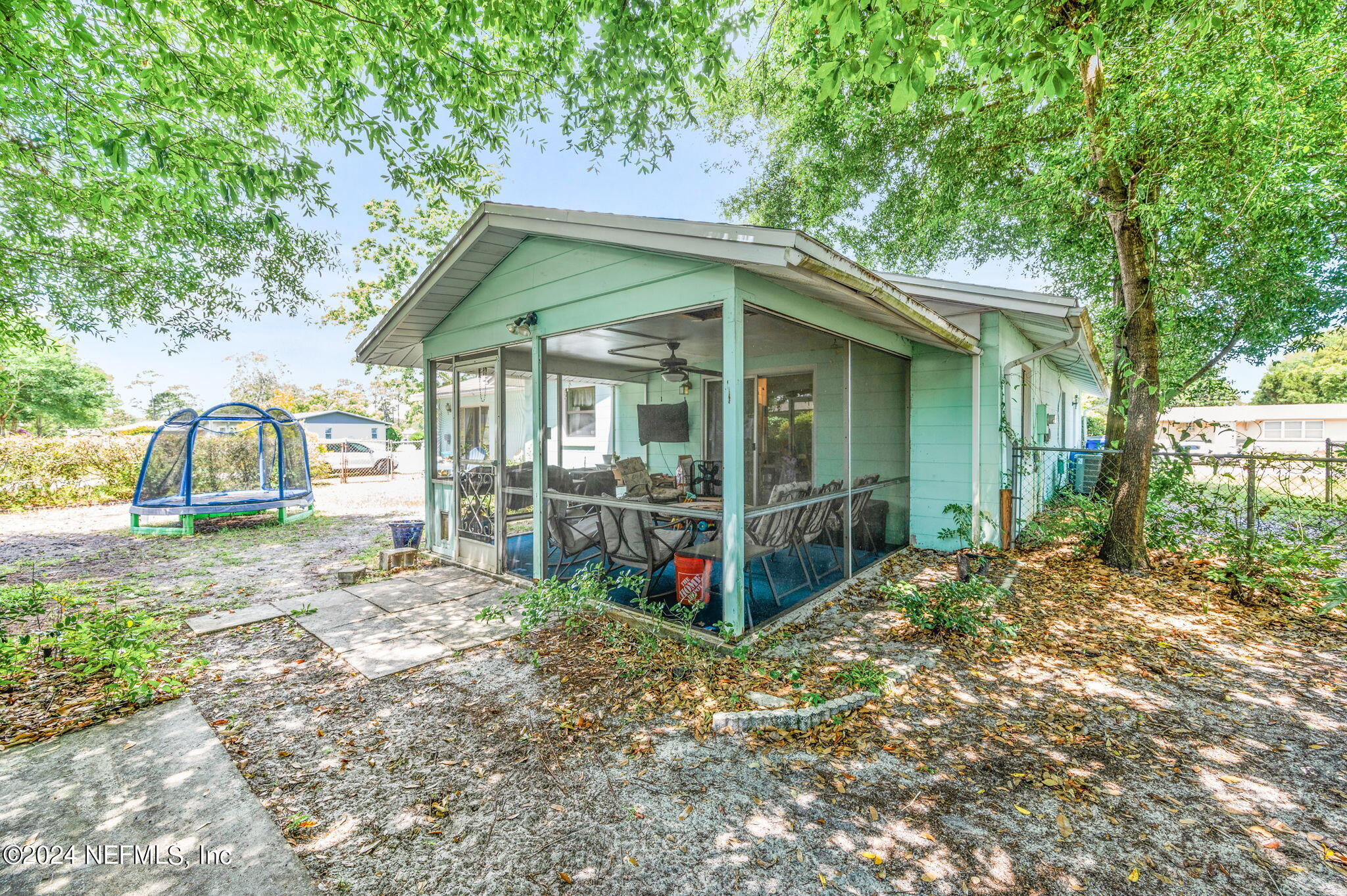 281 Trillo Street St. Augustine, FL 32086 - Photo 35 of 41 a view of a house with a yard balcony and large tree