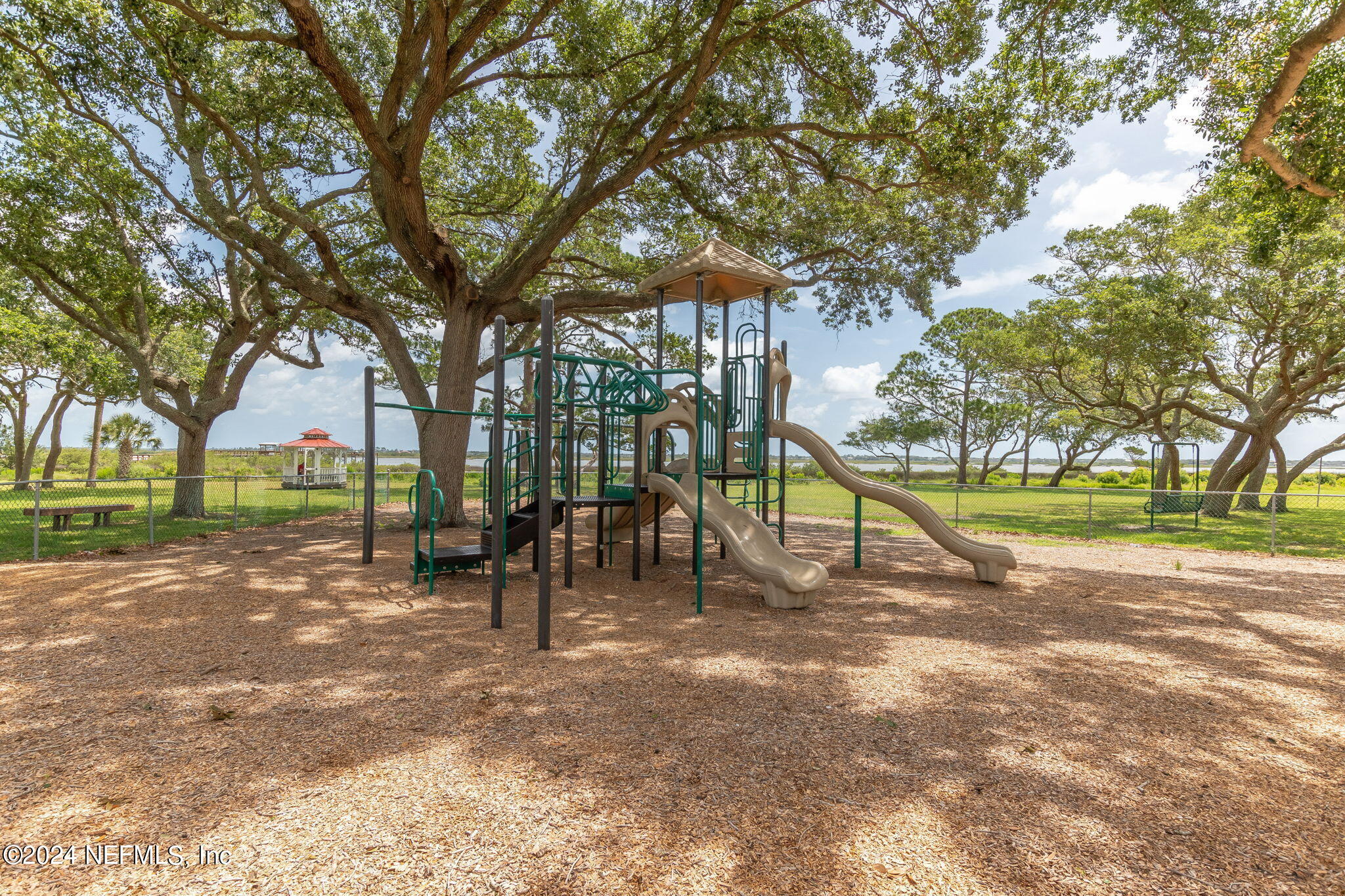 281 Trillo Street St. Augustine, FL 32086 - Photo 39 of 41 a view of a park with swings and slides