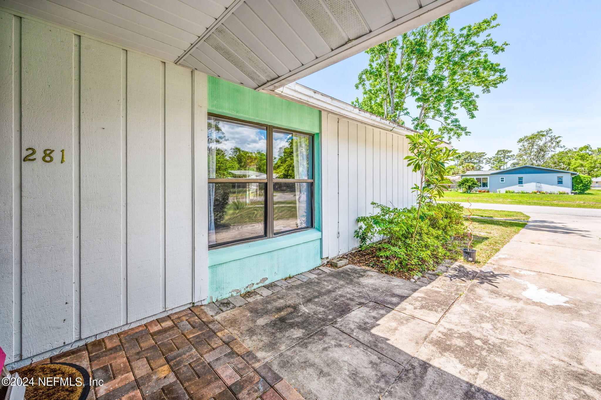 281 Trillo Street St. Augustine, FL 32086 - Photo 4 of 41 a front view of a house with garden