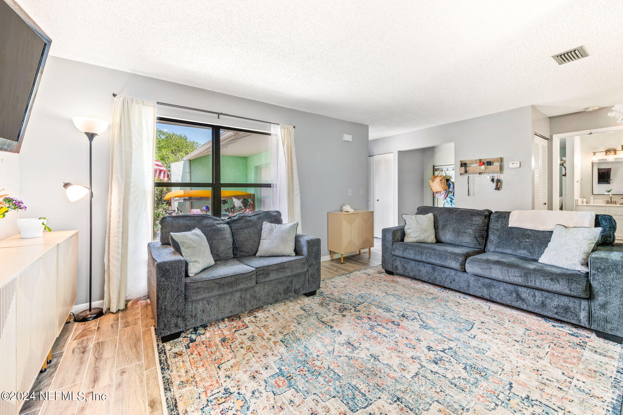 281 Trillo Street St. Augustine, FL 32086 - Photo 5 of 41 a living room with furniture and a large window