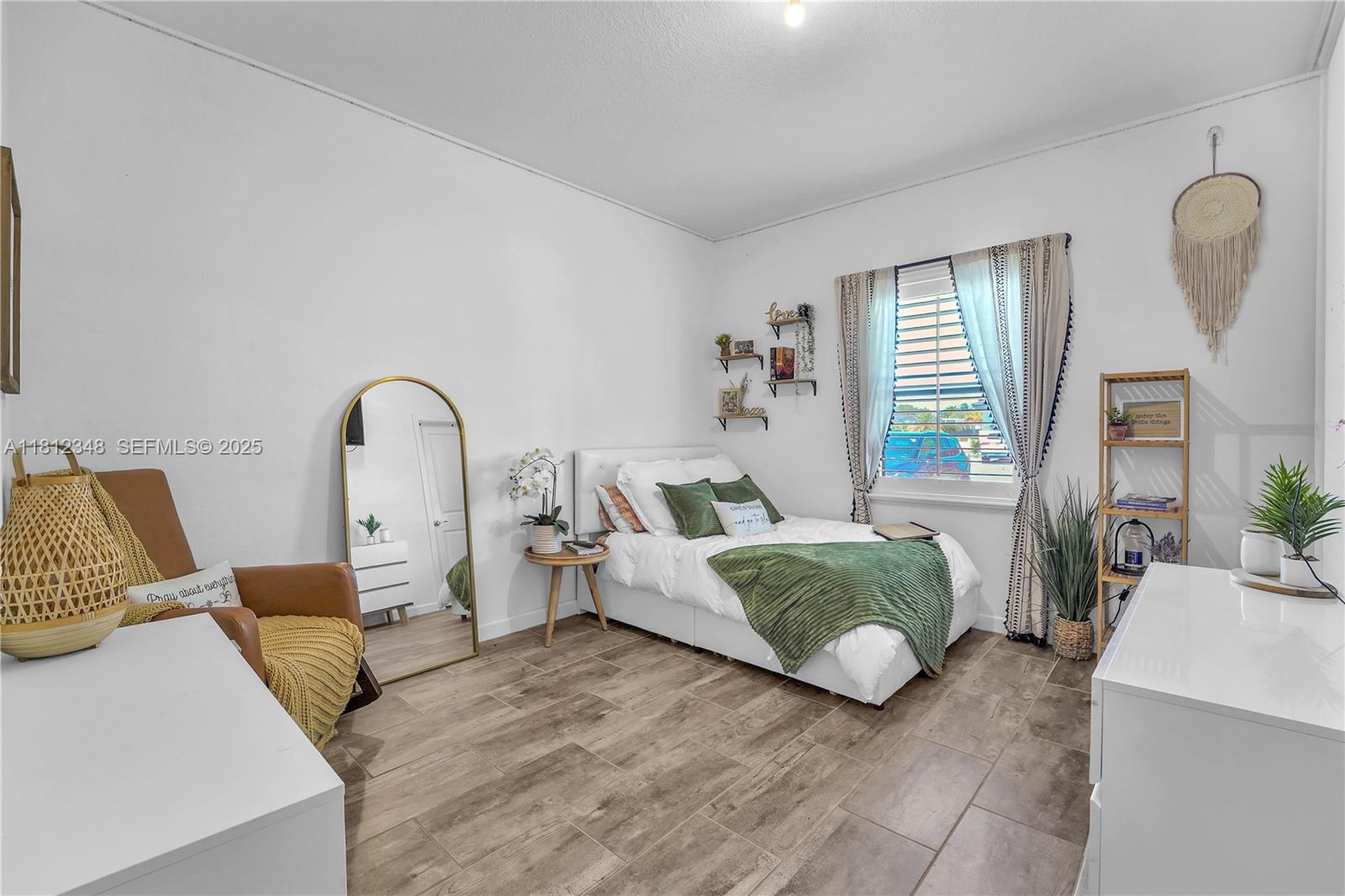 21342 Southwest 132nd Place Miami, FL 33177 - Photo 13 of 16 a living room with furniture