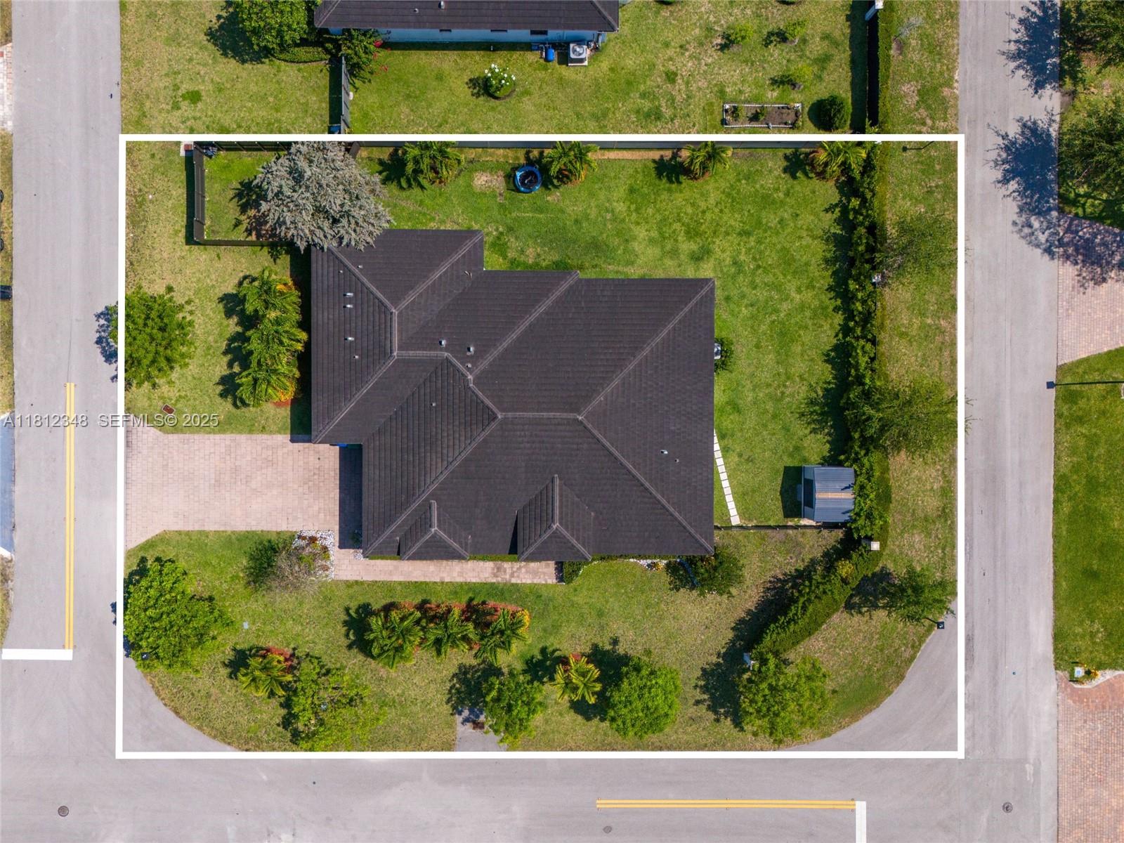 21342 Southwest 132nd Place Miami, FL 33177 - Photo 16 of 16 an aerial view of a house with a yard
