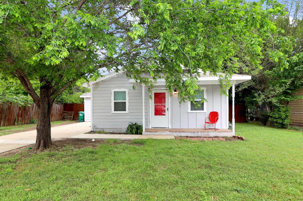 617 Juno Lane Denton, TX 76209 - Photo 1 of 1 a front view of house with yard and outdoor seating