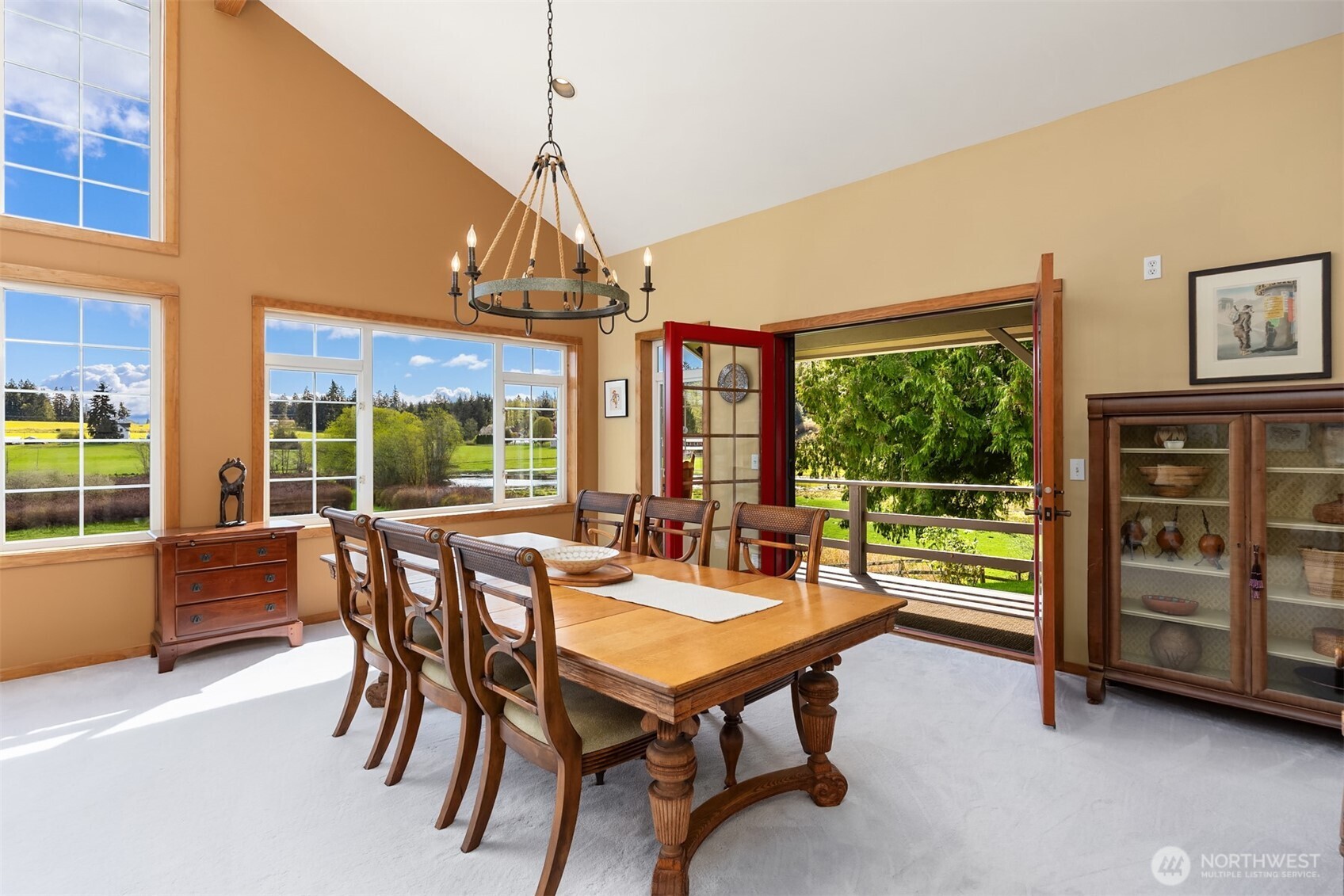 37695 Hansville Road Northeast Hansville, WA 98340 - Photo 9 of 37 a dining room with furniture mountain and outdoor view