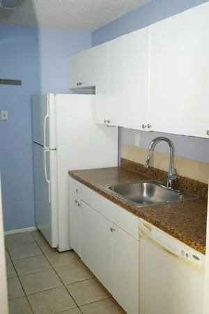 $1,800 | 1133 Benoist Farms Road, Unit 105, West Palm Beach, FL 33411