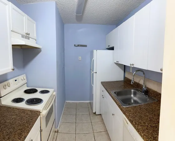 $1,800 | 1133 Benoist Farms Road, Unit 105, West Palm Beach, FL 33411