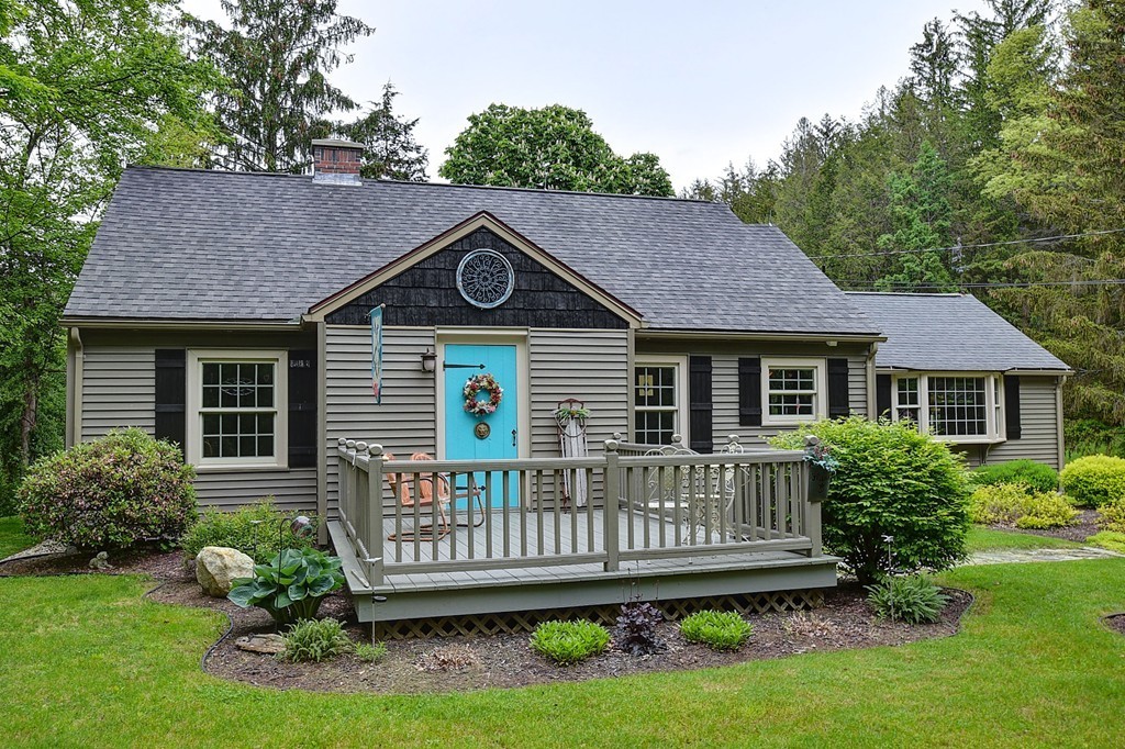 134 Brimfield Road Monson, MA 01057 - Photo 1 of 27 a view of a house with a yard and a garden