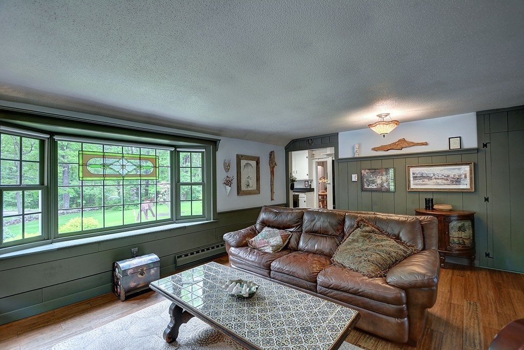 134 Brimfield Road Monson, MA 01057 - Photo 13 of 27 a living room with furniture and a large window