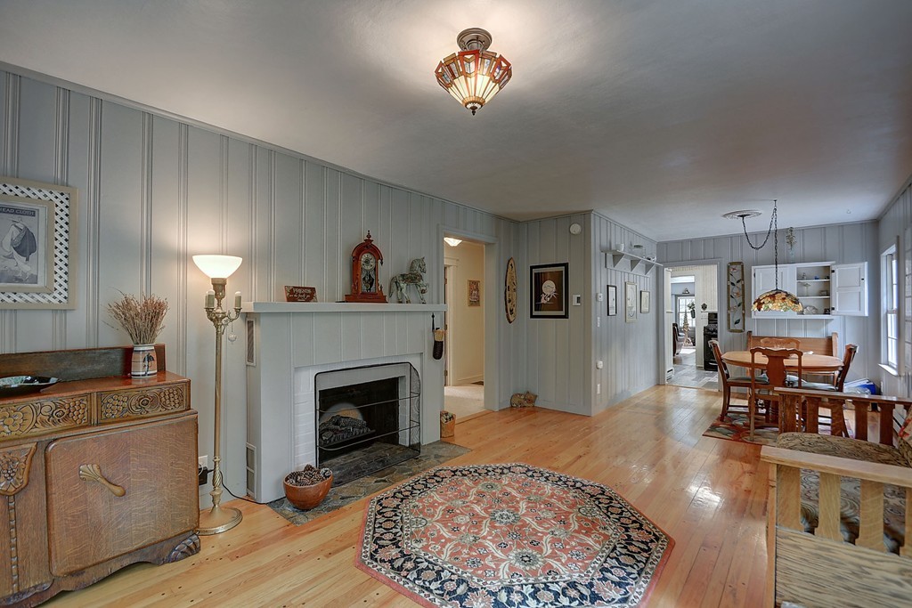 134 Brimfield Road Monson, MA 01057 - Photo 22 of 27 a living room with furniture and a fireplace