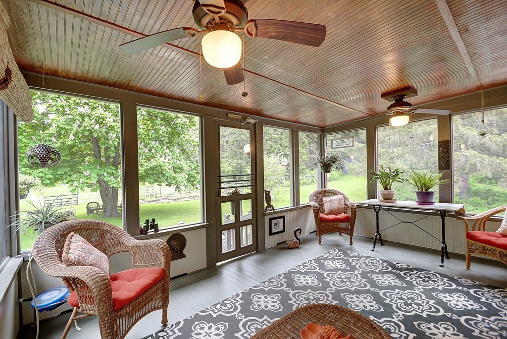134 Brimfield Road Monson, MA 01057 - Photo 10 of 27 a living room with furniture and a large window