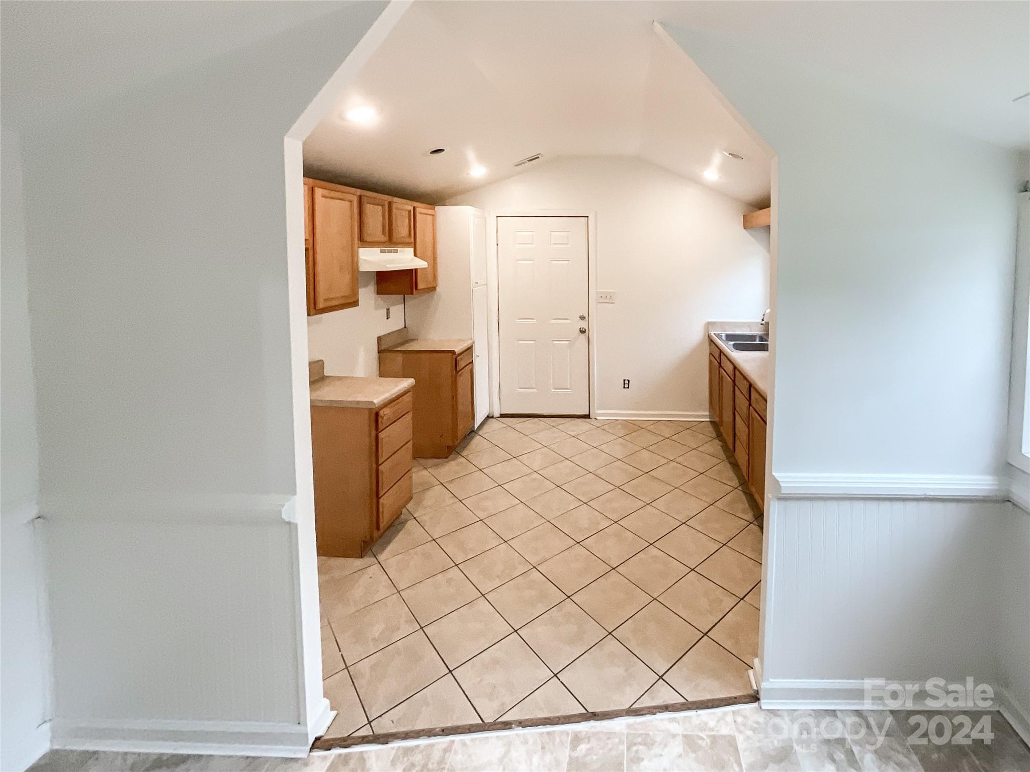 719 Pickett Street Rockingham, NC 28379 - Photo 25 of 36 a bathroom with a sink a toilet and mirror