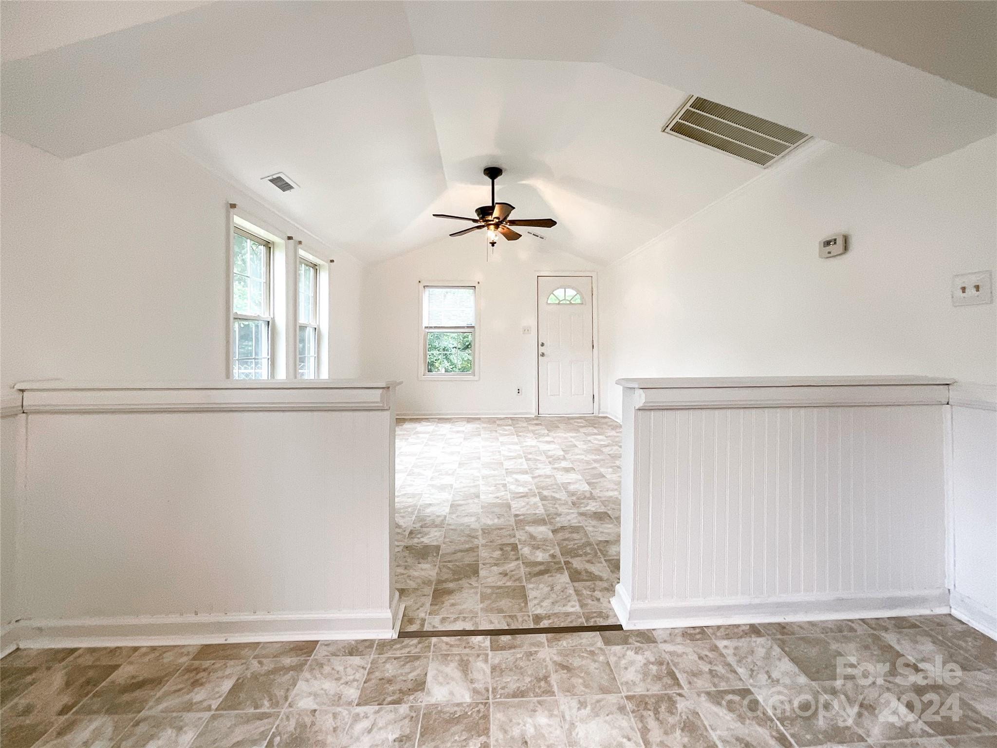 719 Pickett Street Rockingham, NC 28379 - Photo 3 of 36 a view of a room with window and ceiling fan