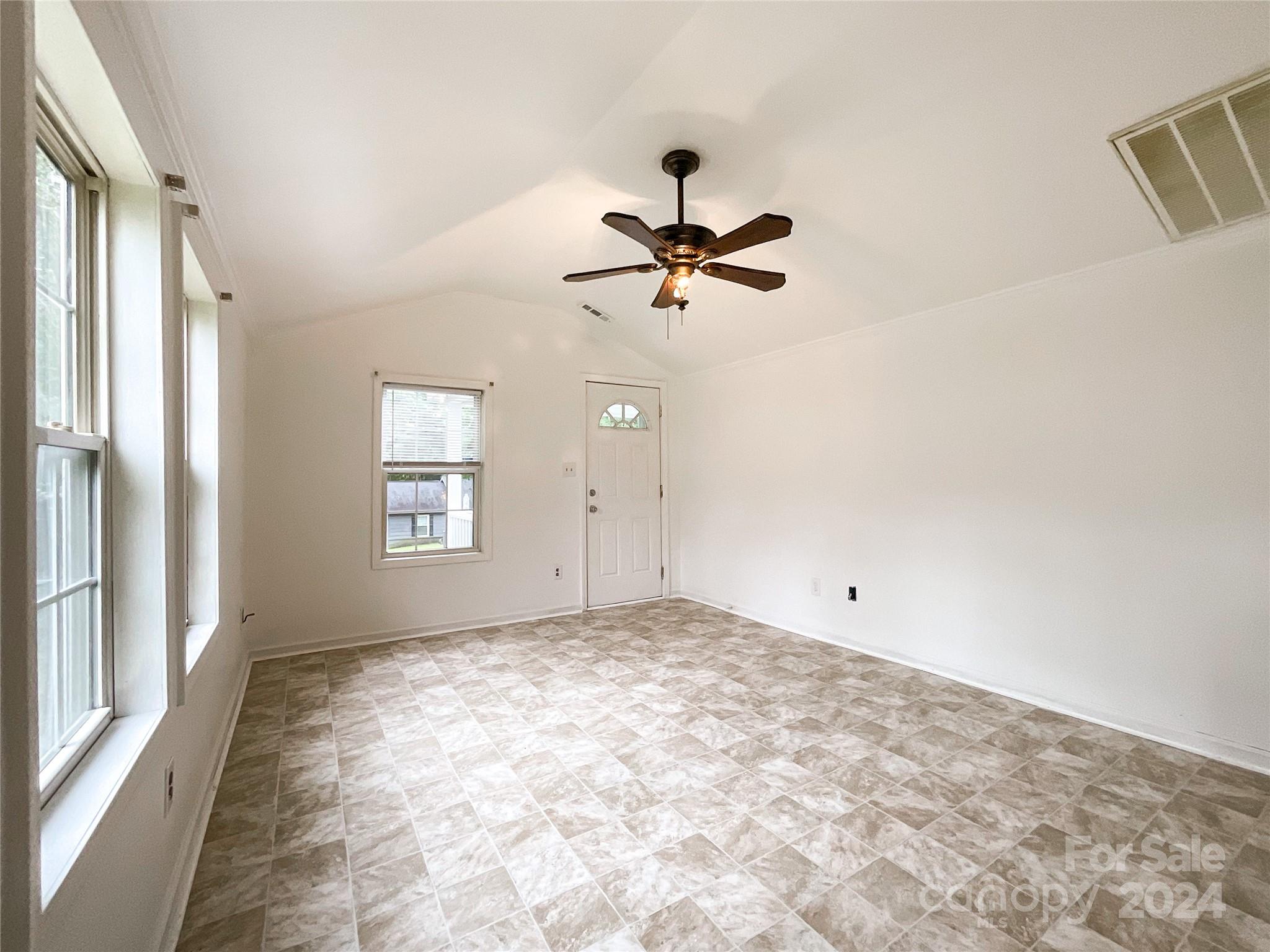 719 Pickett Street Rockingham, NC 28379 - Photo 5 of 36 a view of an empty room
