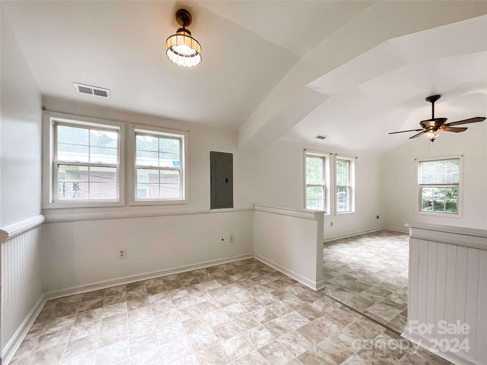 719 Pickett Street Rockingham, NC 28379 - Photo 7 of 36 a view of an empty room with a window