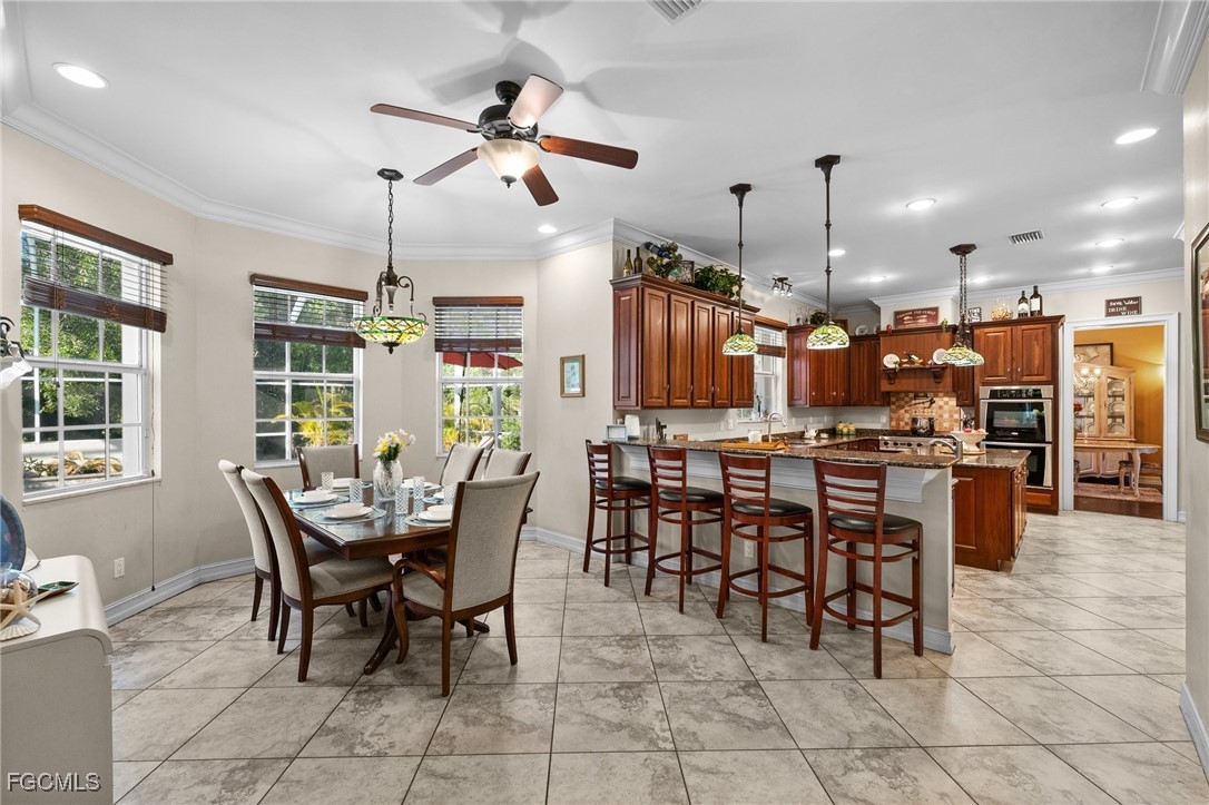 13350 Shetland Lane Fort Myers, FL 33912 - Photo 20 of 49 a view of a dining area with furniture