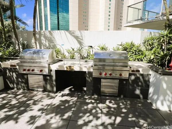 a living room with gym equipment and a large window