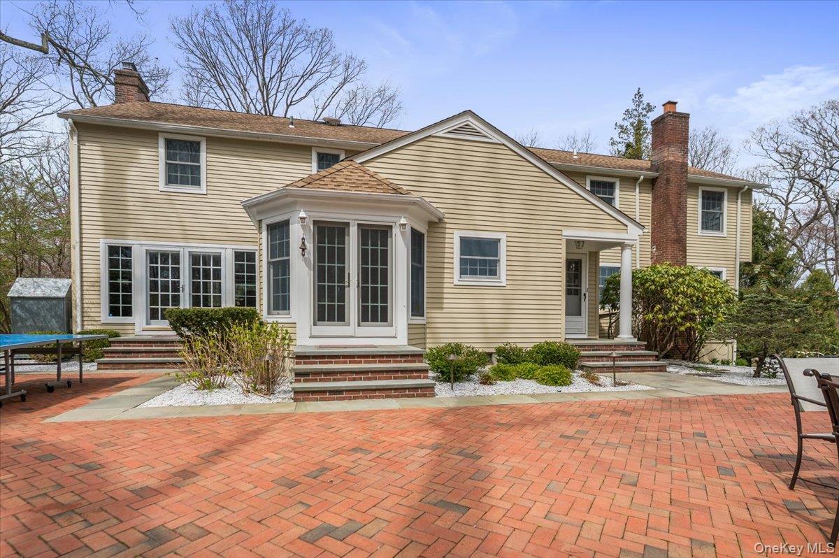 4 Springwood Path Syosset, NY 11791 - Photo 39 of 47 View to french doors leading from patio directly to the kitchen.