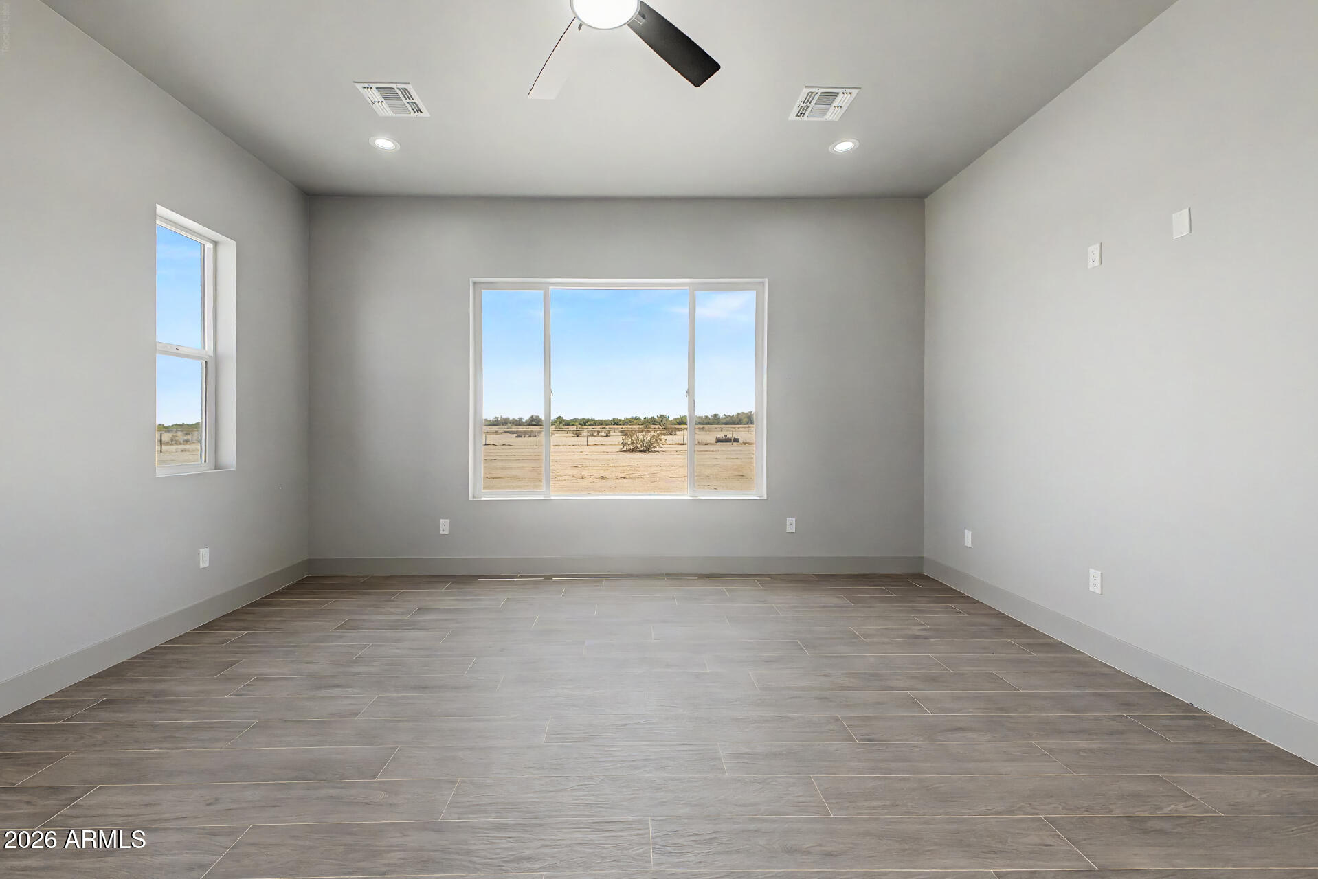 40461 West Robles Road Stanfield, AZ 85172 - Photo 35 of 54 an empty room with windows