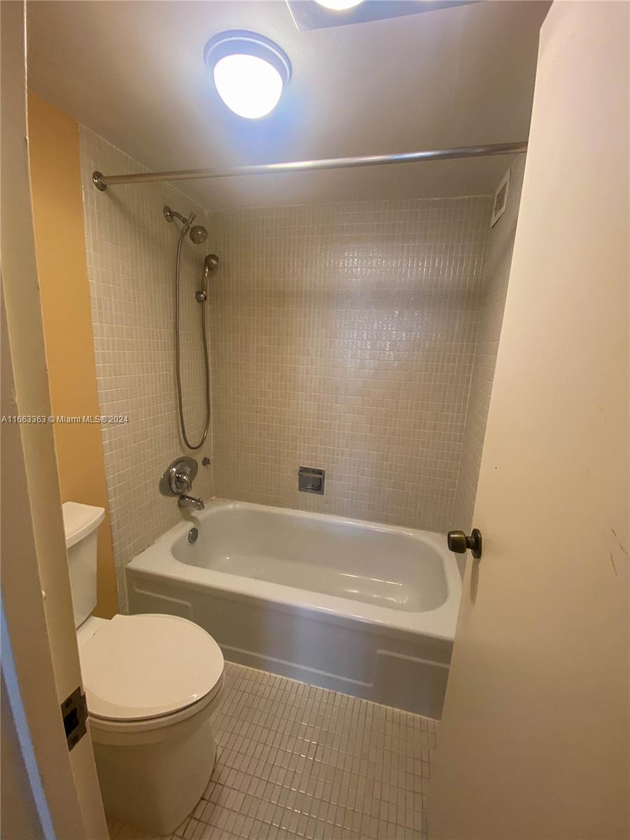 9511 Collins Avenue, Unit 408 Surfside, FL 33154 - Photo 22 of 24 Guest Bath