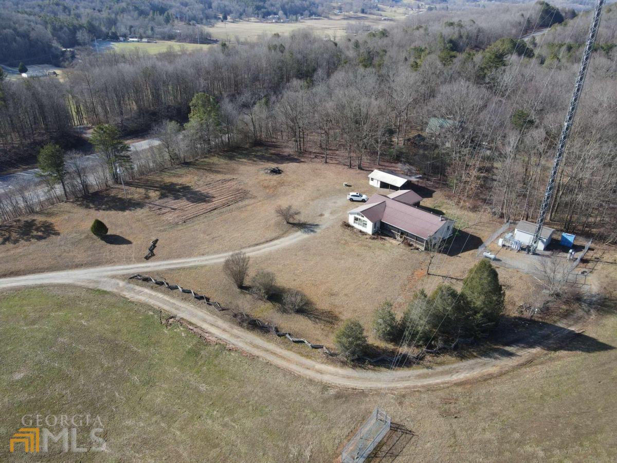 2166 Wright Mill Road Morganton, GA 30560 - Photo 1 of 1 a view of a yard with wooden fence