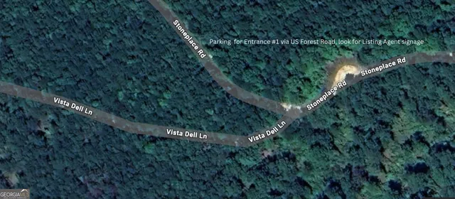 a view of a lake with a park