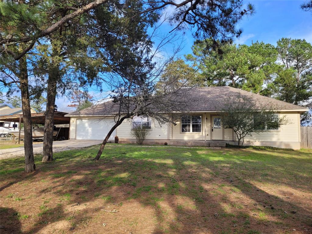 107 Rangeland Road Bastrop, TX 78602 - Photo 1 of 1 Corner lot with nice trees