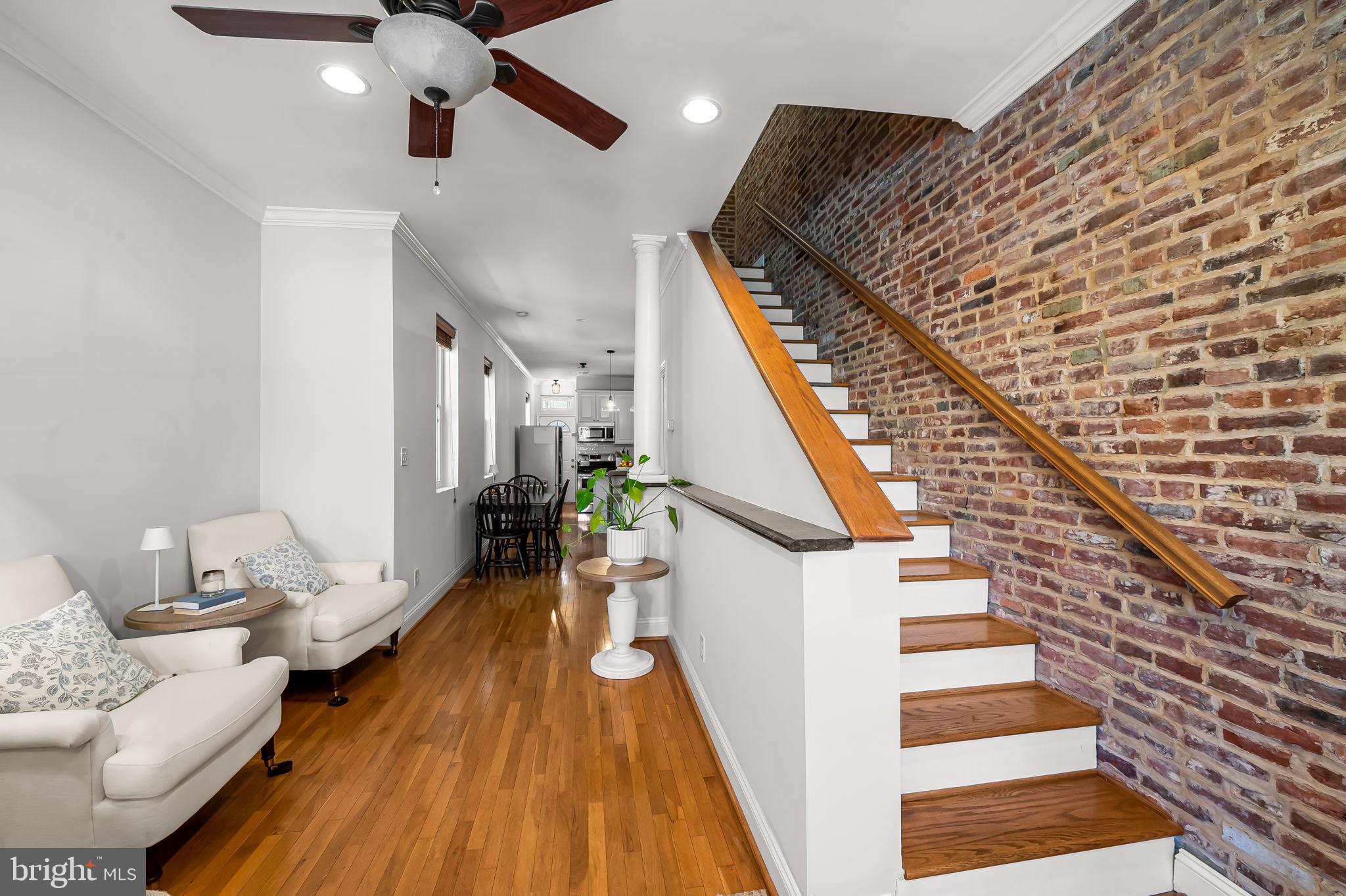 61 East Heath Street Baltimore, MD 21230 - Photo 5 of 30 a view of entryway and hall with wooden floor