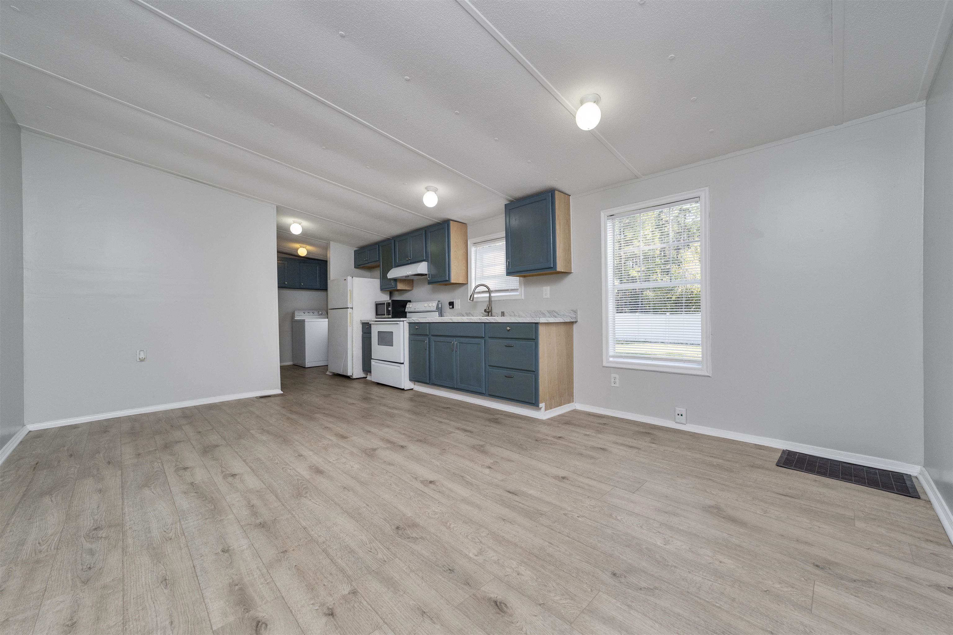 2905 County Road 214, Unit D St. Augustine, FL 32084 - Photo 13 of 46 a view of kitchen and microwave