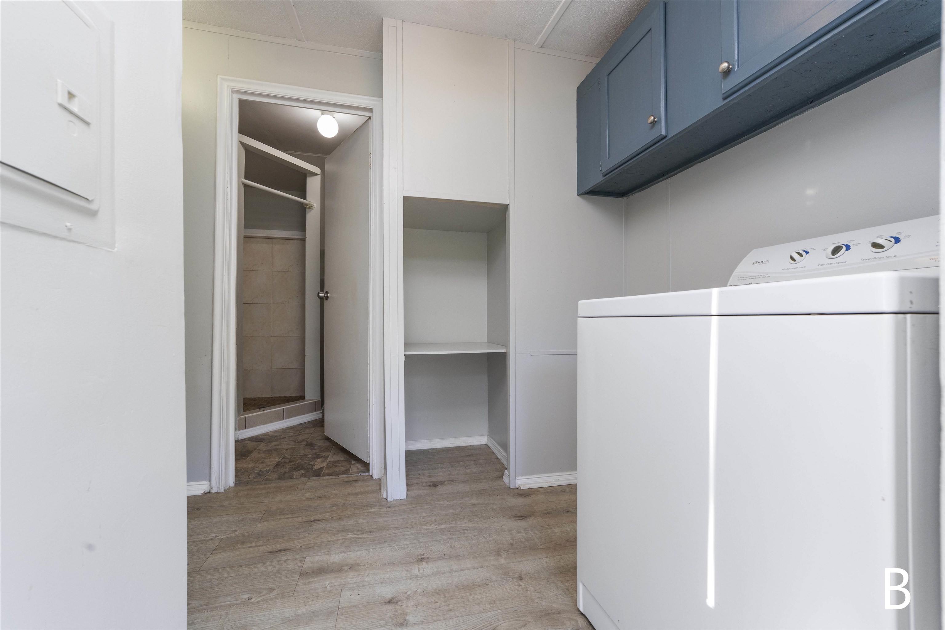 2905 County Road 214, Unit D St. Augustine, FL 32084 - Photo 21 of 46 a view of a kitchen with a sink and refrigerator