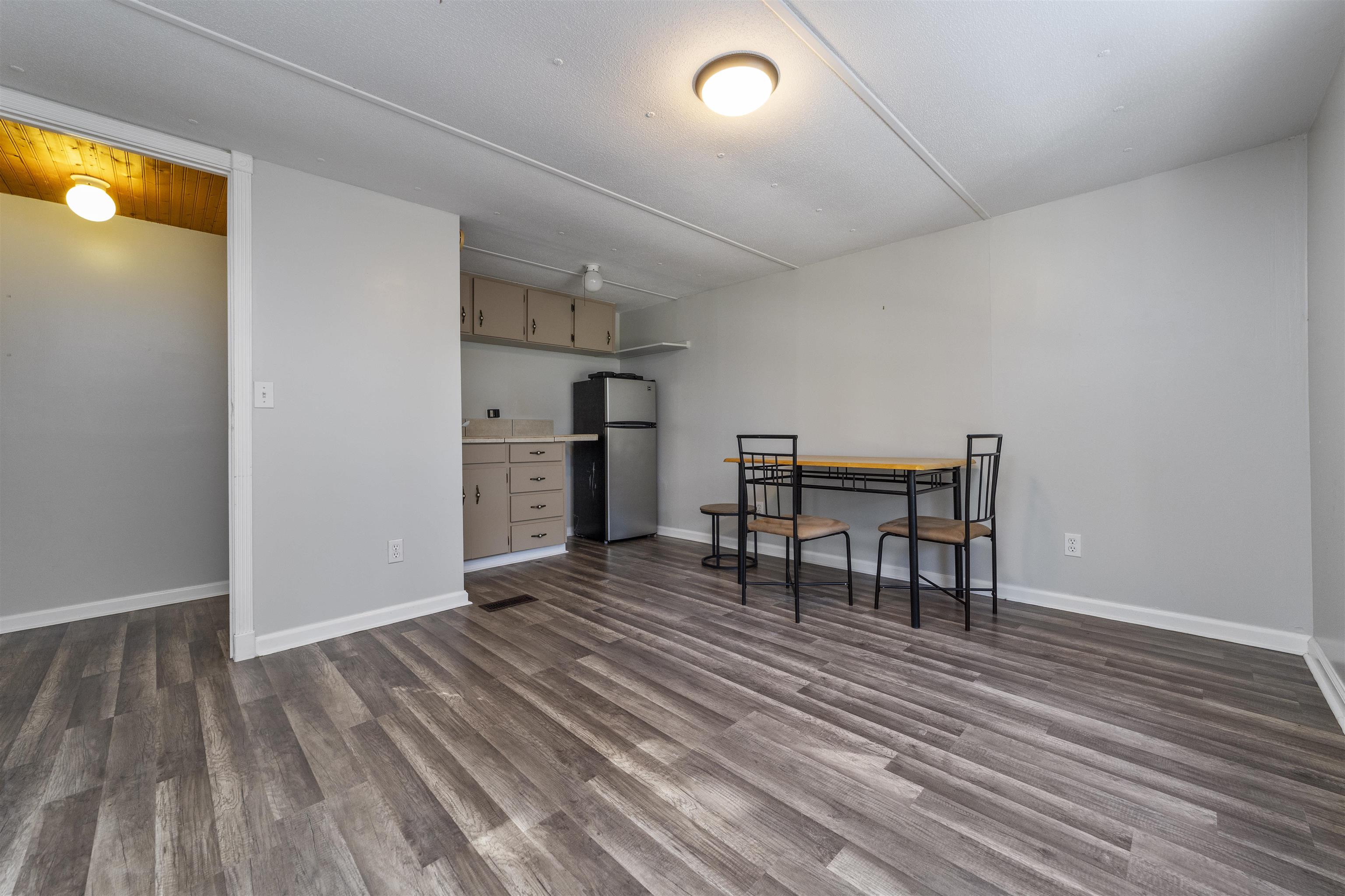 2905 County Road 214, Unit D St. Augustine, FL 32084 - Photo 27 of 46 a view of a room with furniture and wooden floor