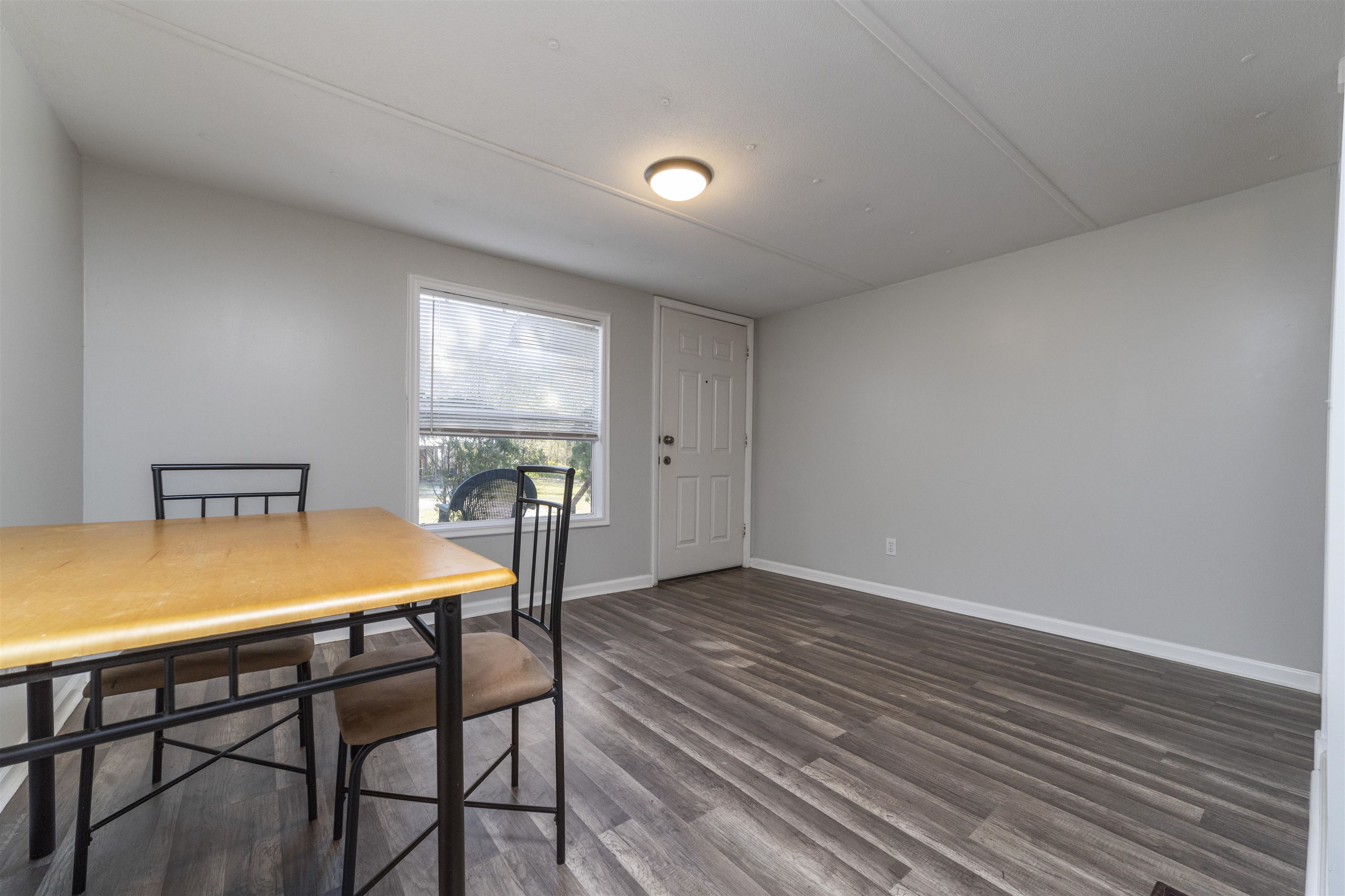 2905 County Road 214, Unit D St. Augustine, FL 32084 - Photo 28 of 46 a dining room with furniture and window