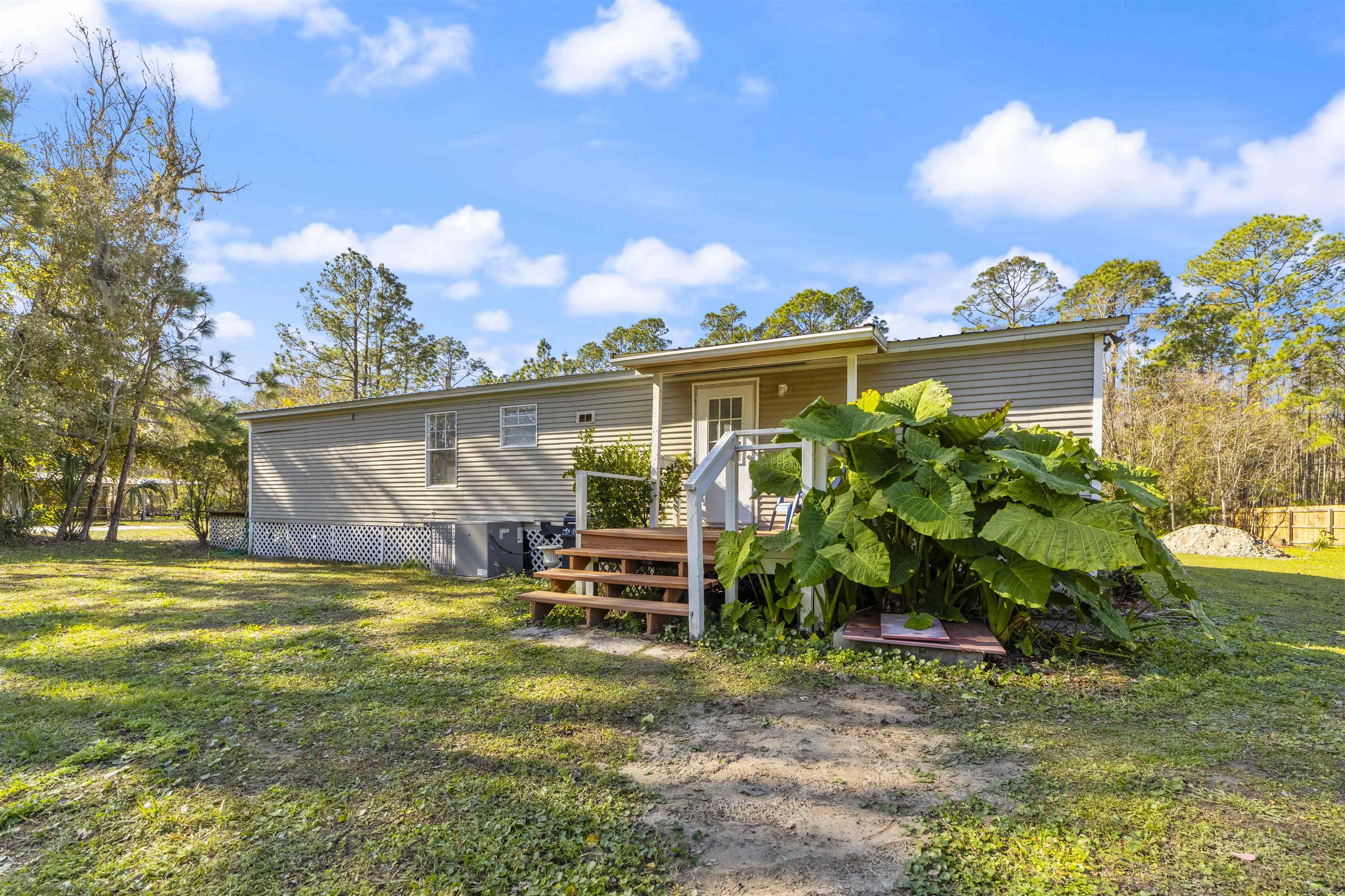 2905 County Road 214, Unit D St. Augustine, FL 32084 - Photo 36 of 46 a view of a house with backyard