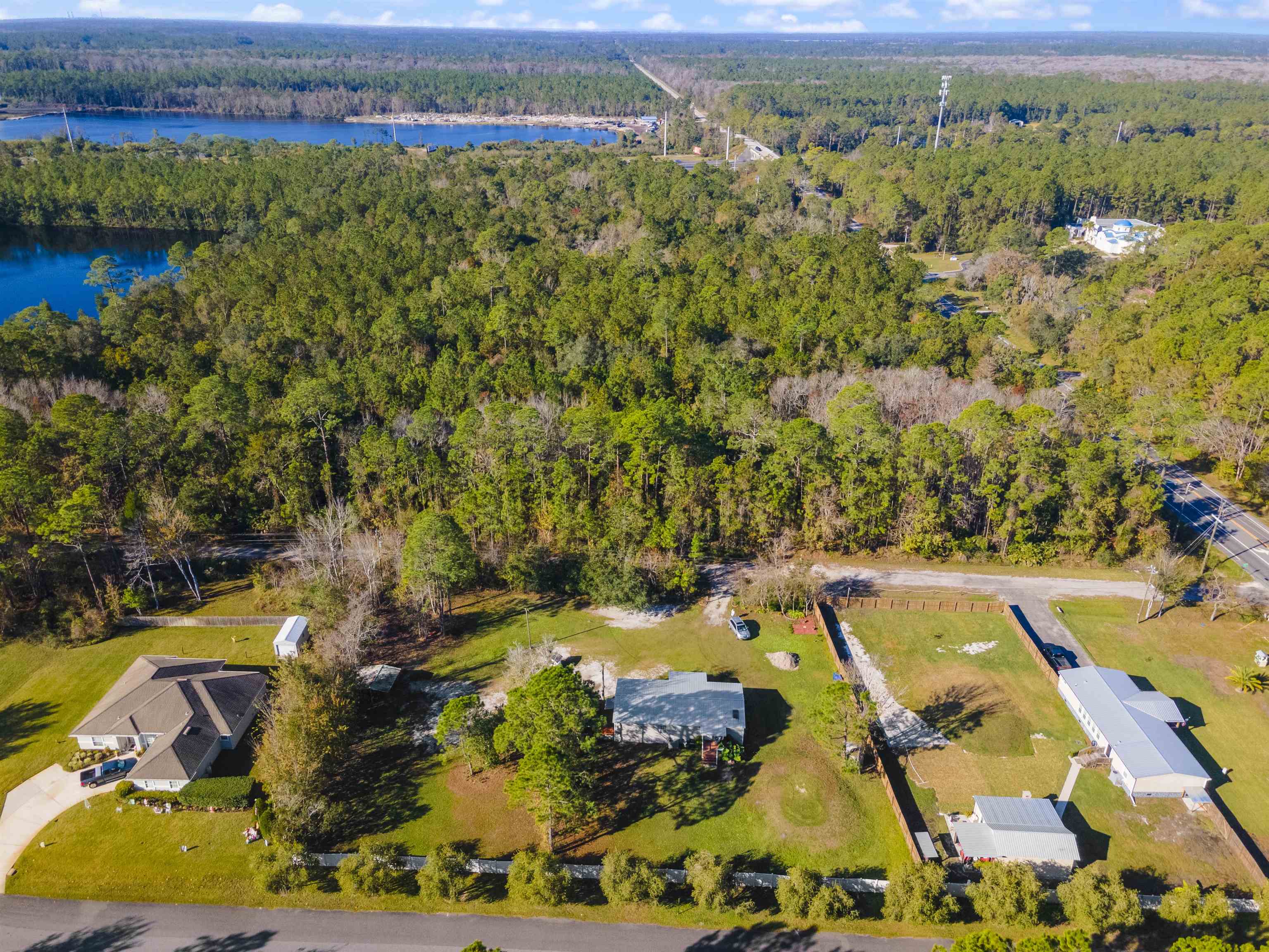2905 County Road 214, Unit D St. Augustine, FL 32084 - Photo 38 of 46 an aerial view of residential houses with outdoor space