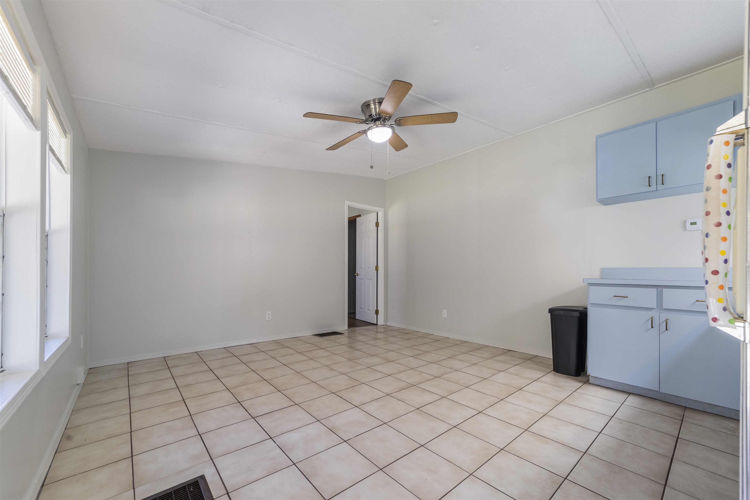 2905 County Road 214, Unit D St. Augustine, FL 32084 - Photo 4 of 46 a view of a room with cabinets and wooden floor